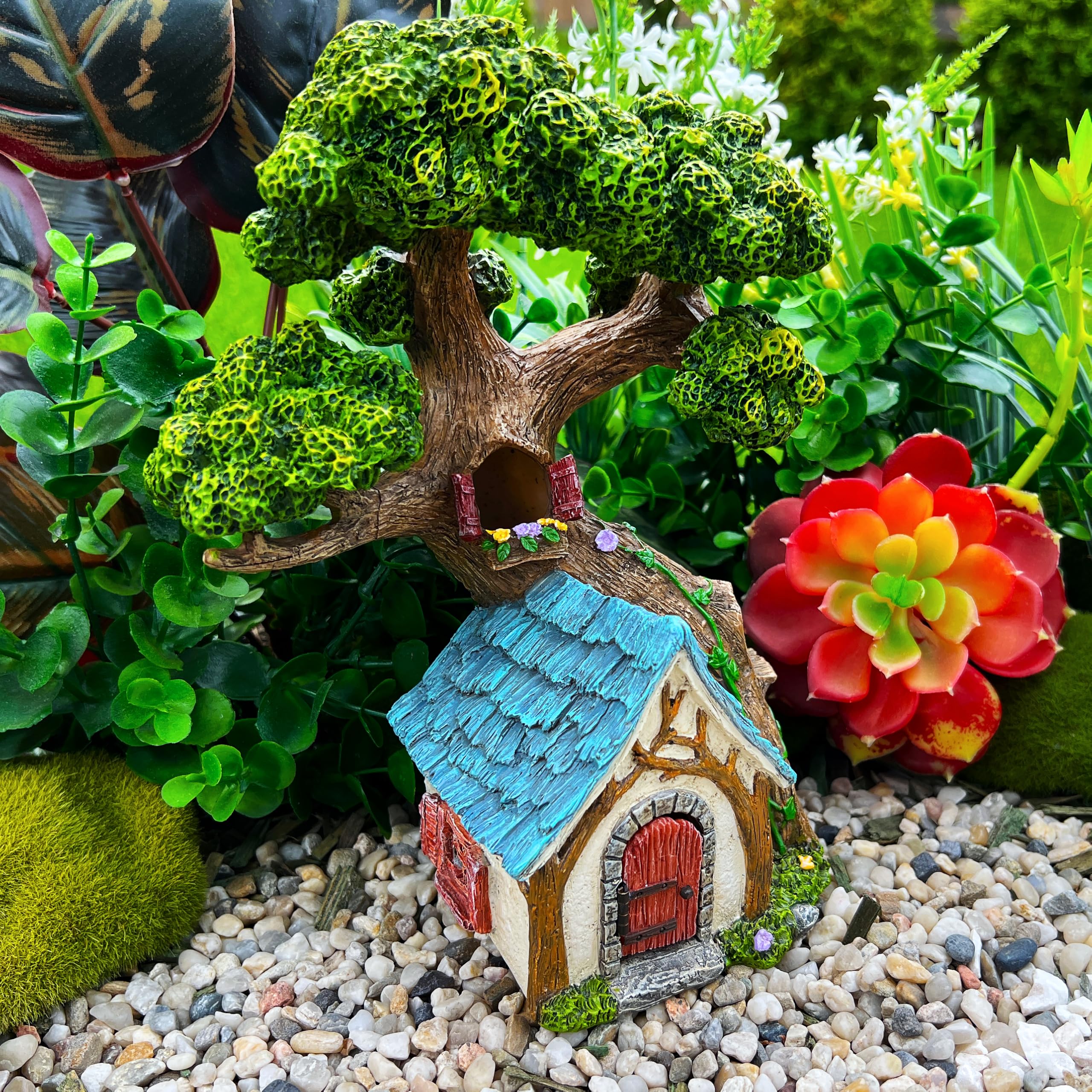Mood Lab Fairy House front view showing sun-protected resin finish outdoors.