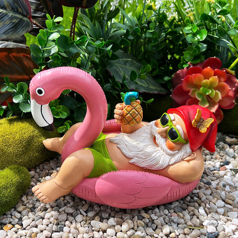 Mood Lab flamingo pose garden decor creates a cheerful focal point.