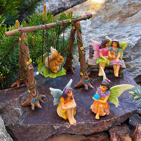 Mood Lab hand-painted fairies add charm to any setting.