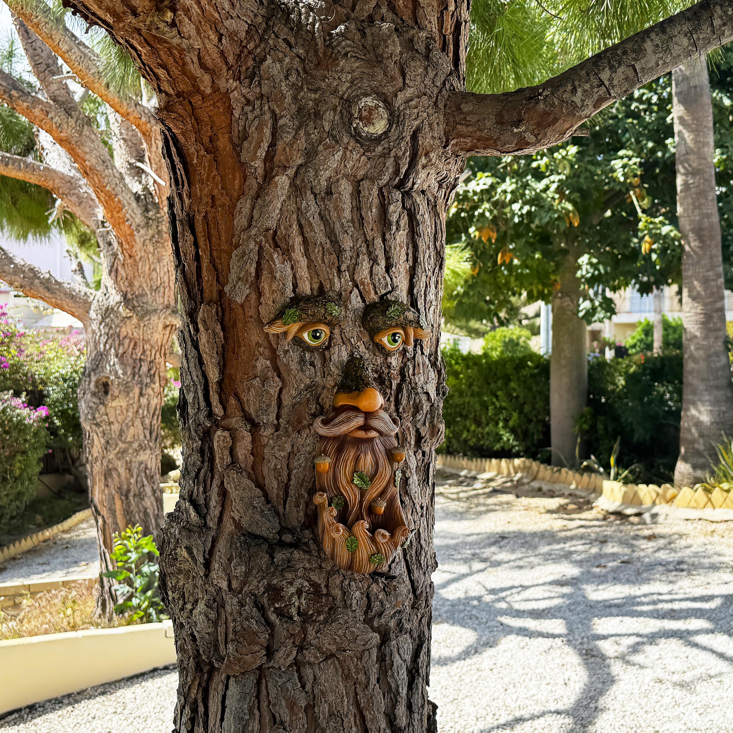 Mood Lab Tree Face Decor garden scene demonstrates weather-ready, sun-protected finish