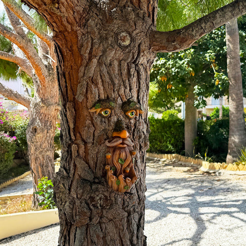 Mood Lab Tree Face Decor garden scene demonstrates weather-ready, sun-protected finish