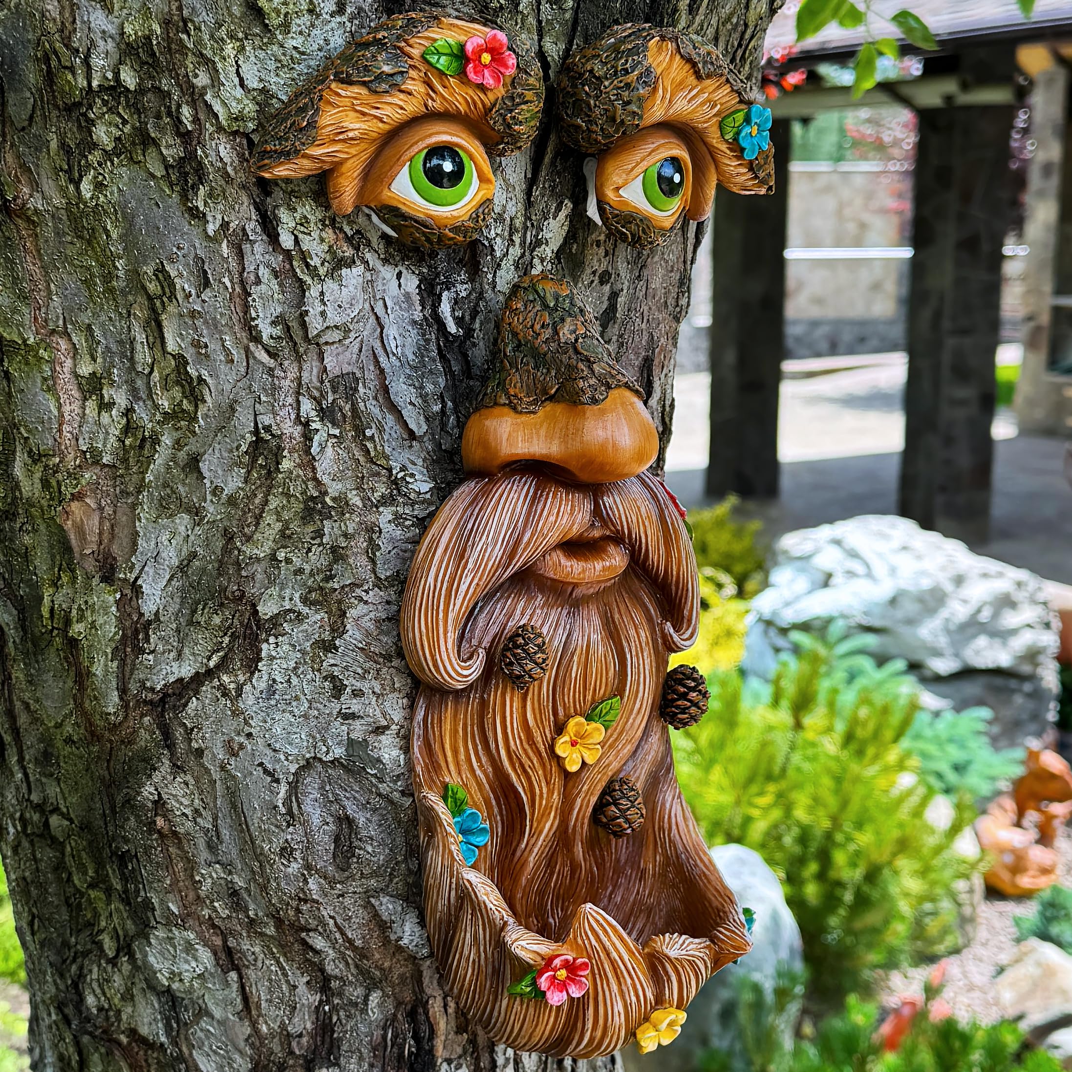 Mood Lab Tree Face Decor features small hooks for easy hanging.