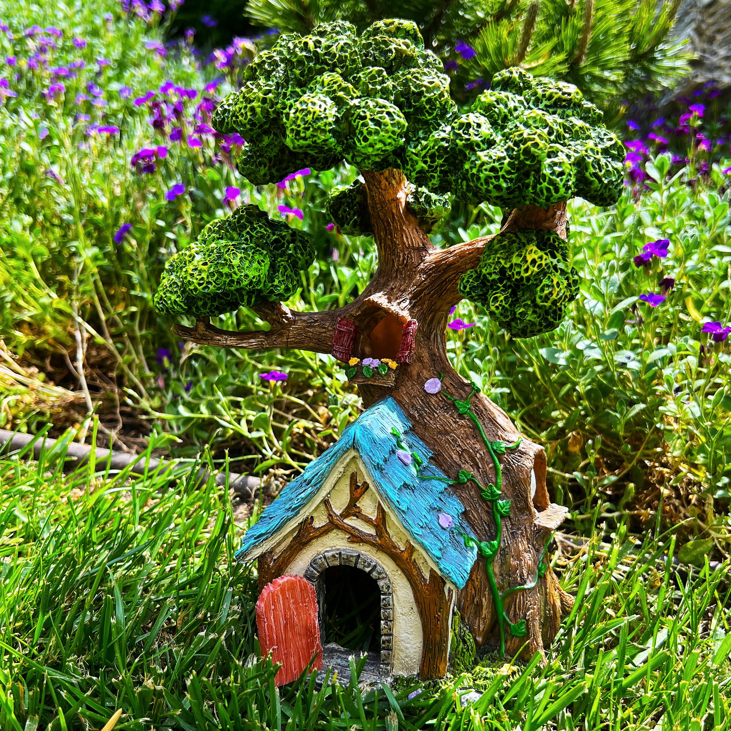 Mood Lab Tree House 8.5-inch outdoor decor with sturdy exterior.