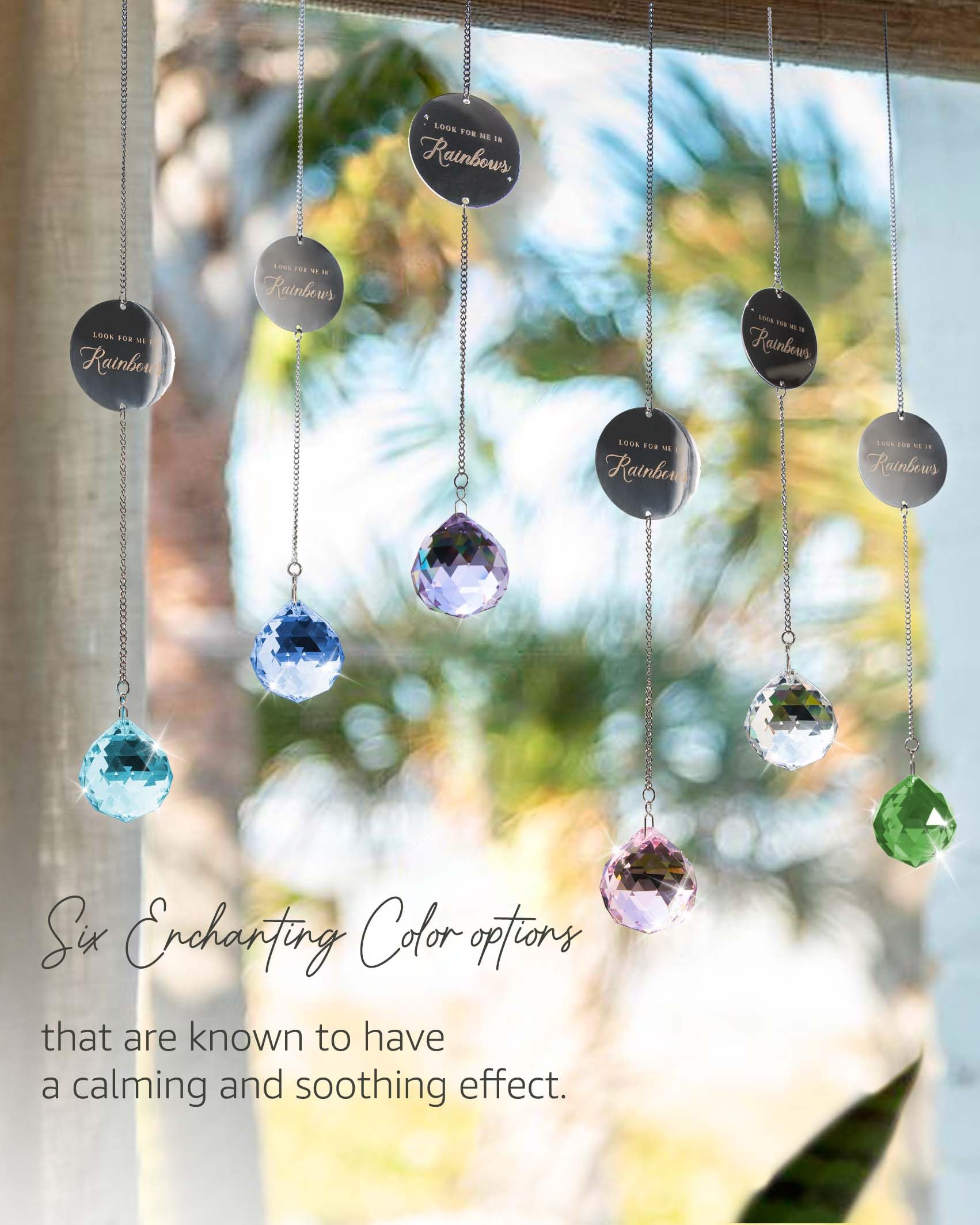 Mooncraftlogy memorial suncatcher hangs near a sunny window.