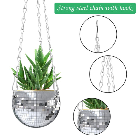 Moonoom disco ball planter on a wooden stand as a centerpiece.