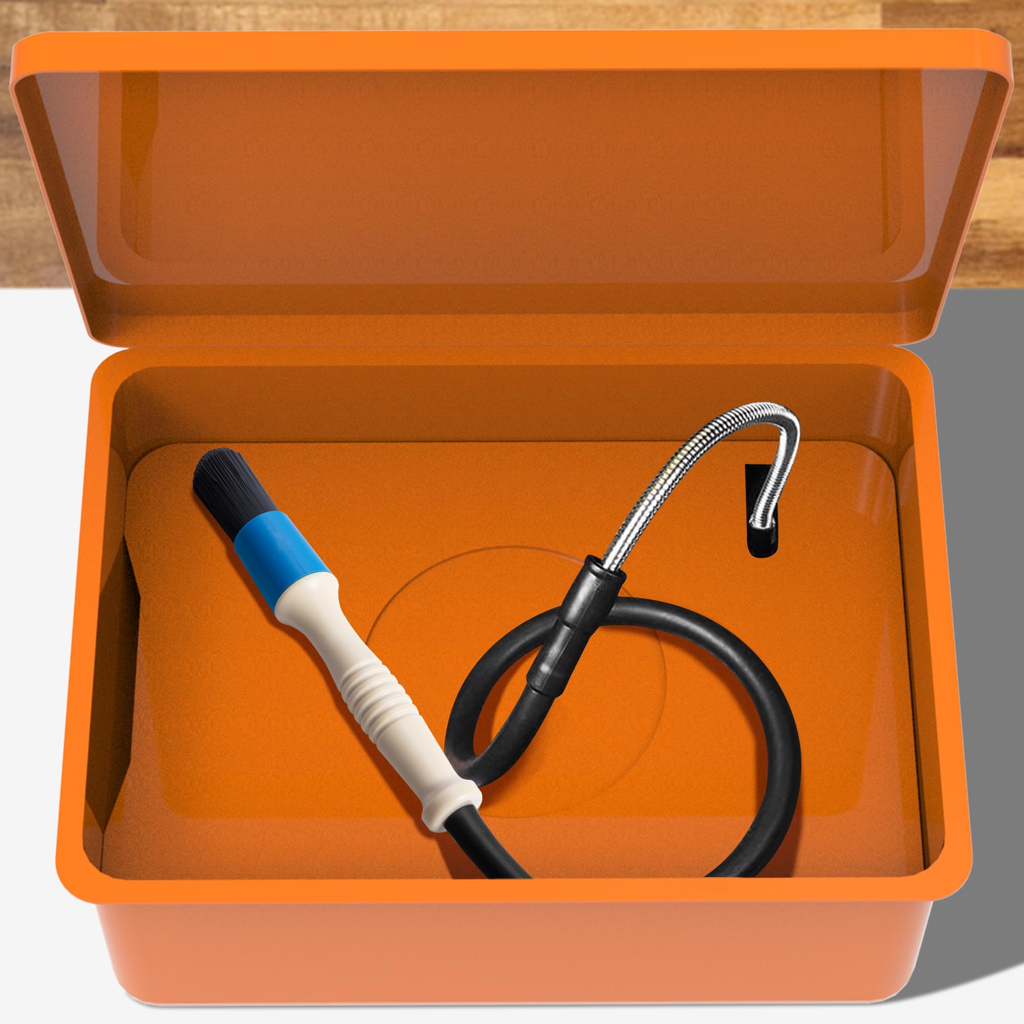 Moonoom in-use scenario shows hose reaching tight engine spaces.