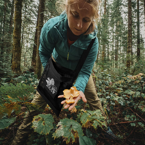 Moonoom foraging bag with adjustable strap enabling chest-level access.