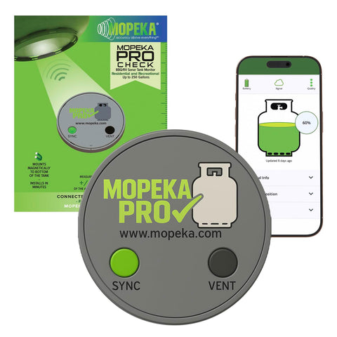 Mopeka Pro Check magnetic sensor attached to propane tank for real-time level monitoring.