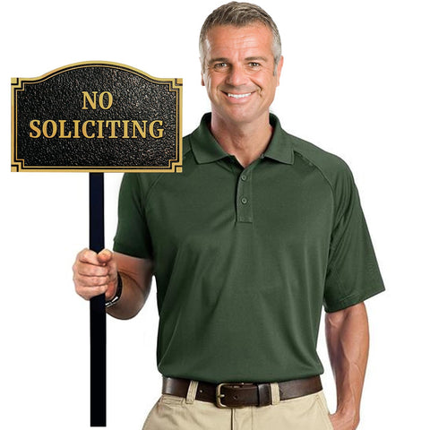 Morgtta embossed letters highlight no soliciting message with classic curb appeal.
