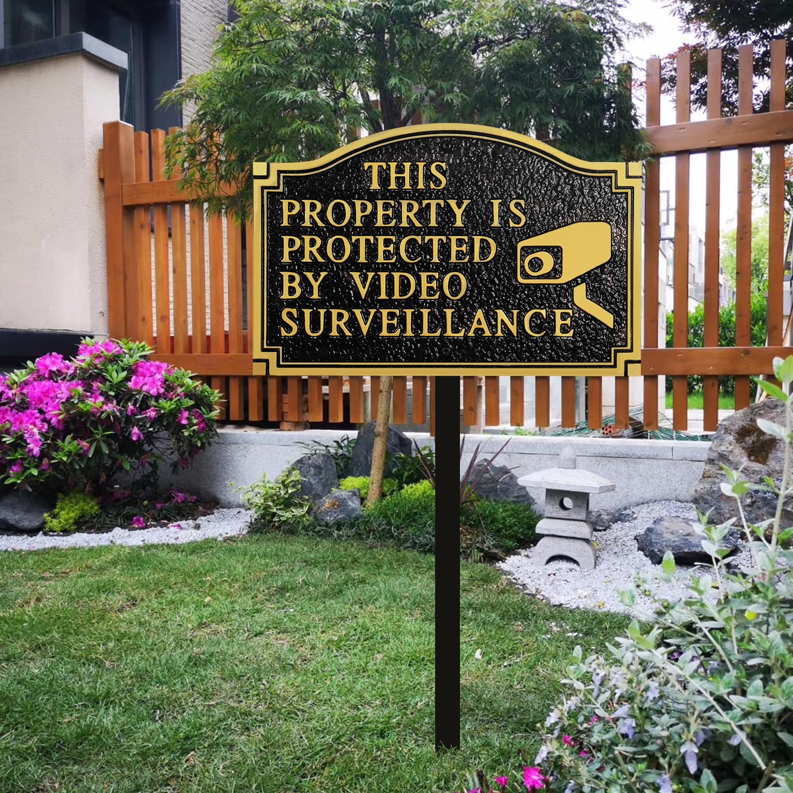 Morgtta embossed 3D gold lettering sign highlights presence of video surveillance for deterrence.