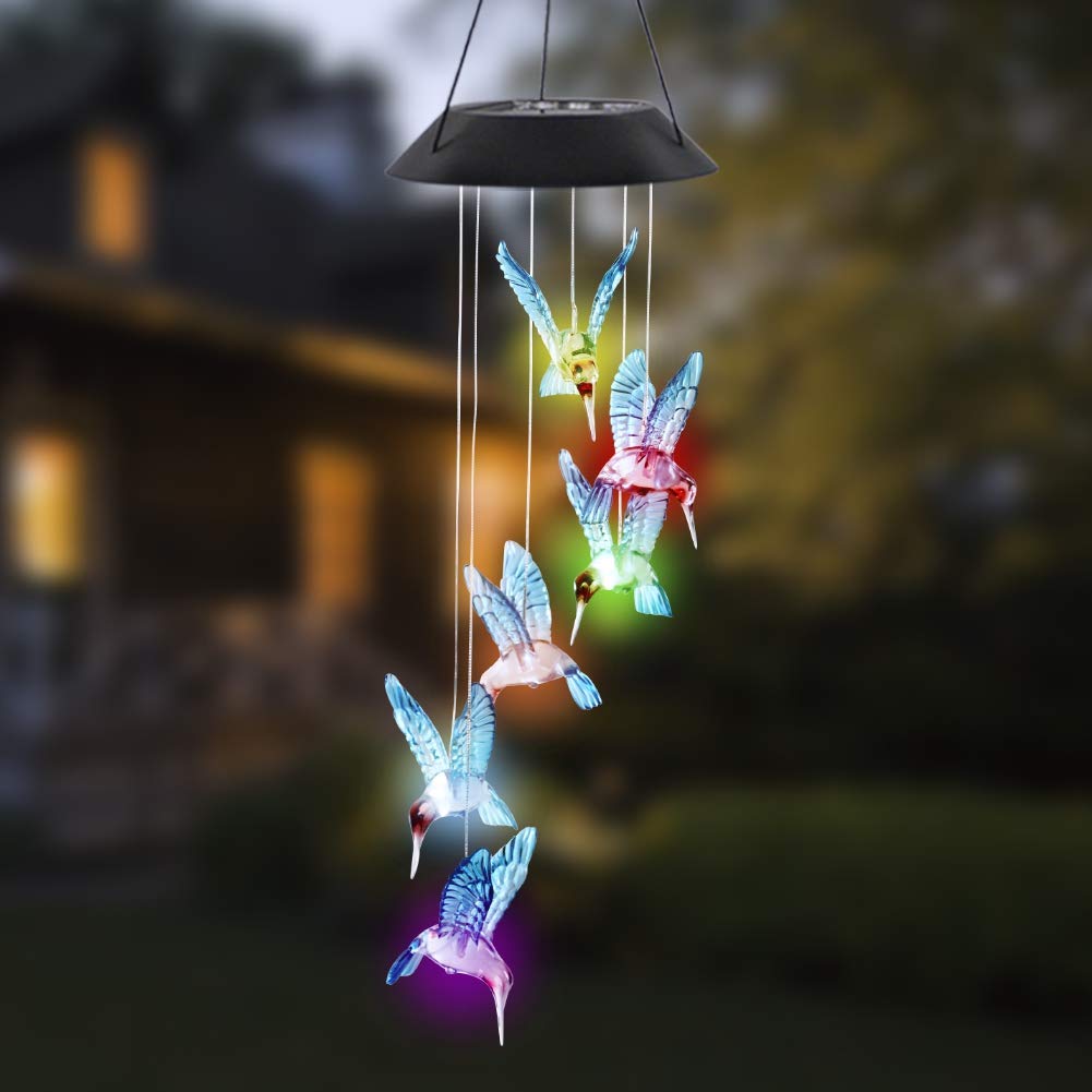MorTime glass hummingbird detail shows glitter and translucence for ambience.