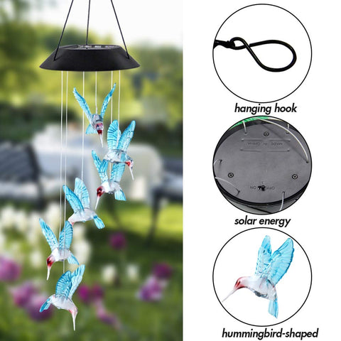MorTime hummingbird wind chime mounted on a tree for warm patio lighting.