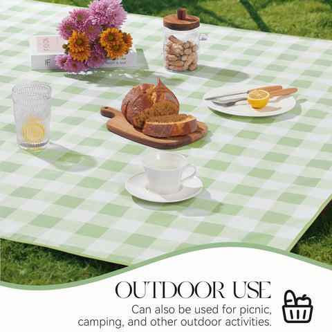 MOSAYT heavy-duty wipeable tablecloth protects tables from heat and spills.