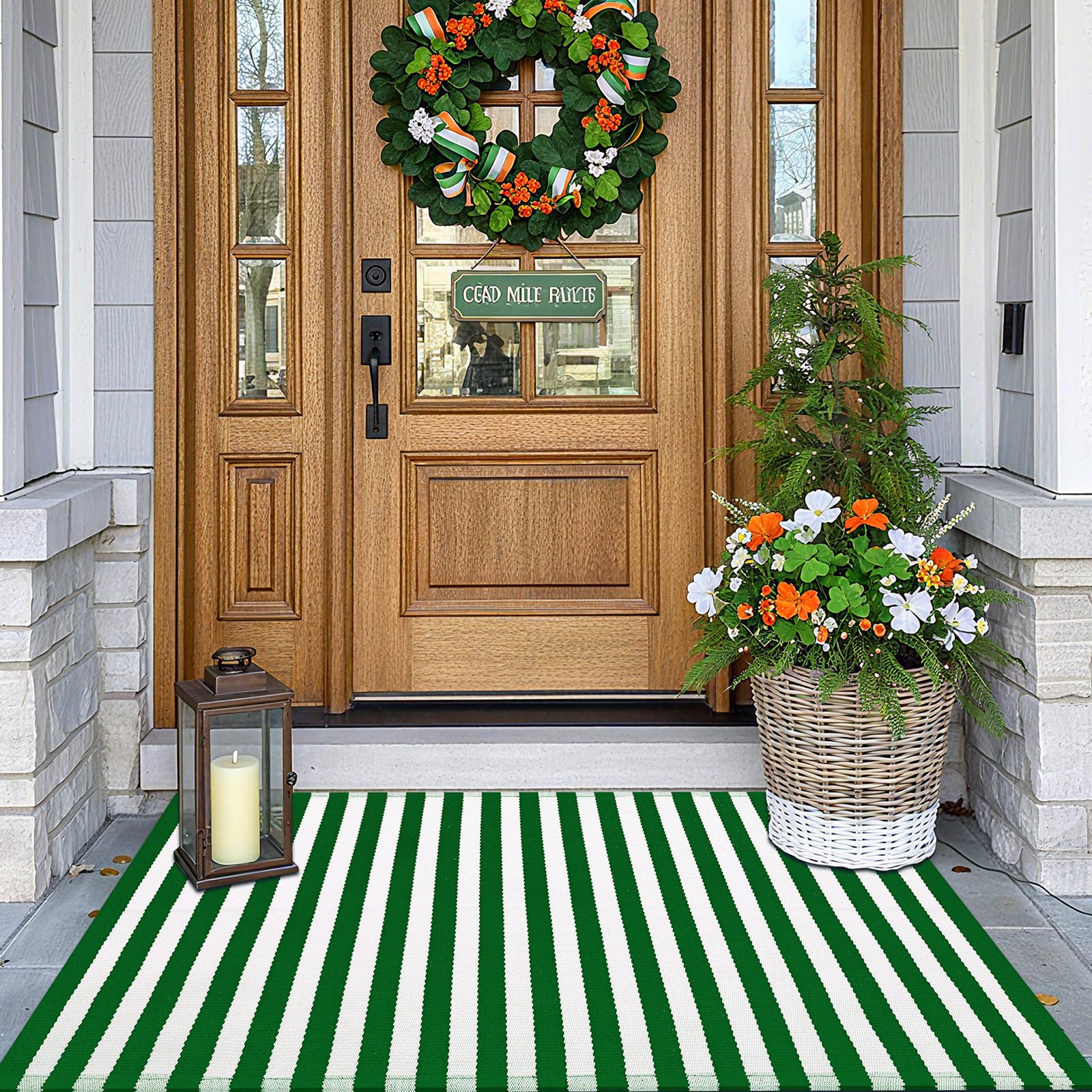 Moucuny Spring striped outdoor rug in green and white adds welcoming curb appeal and durability.