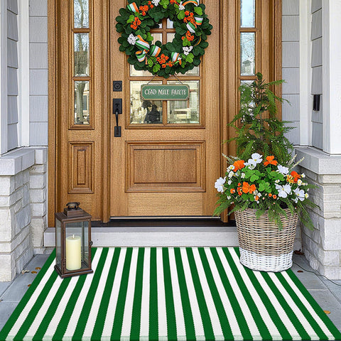Moucuny Spring striped outdoor rug in green and white adds welcoming curb appeal and durability.