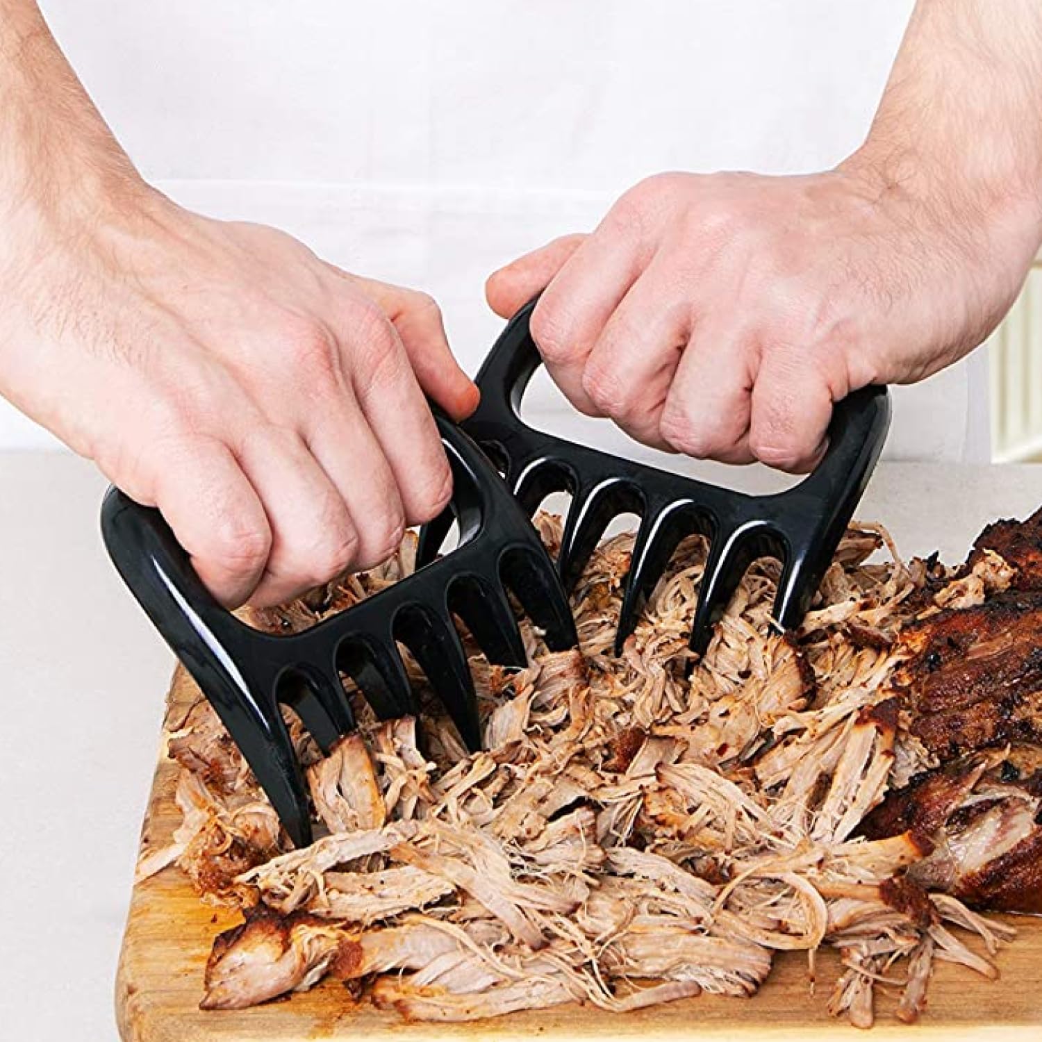 Mountain Grillers Meat Claws on a grill station for meal prep.