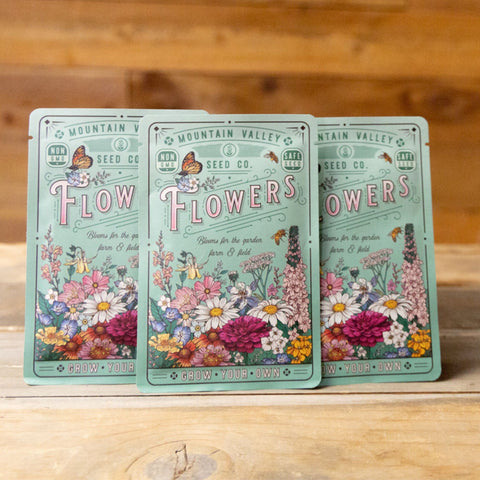 Bees visiting wildflowers from Save The Bees mix, highlighting pollinator-friendly gardening.