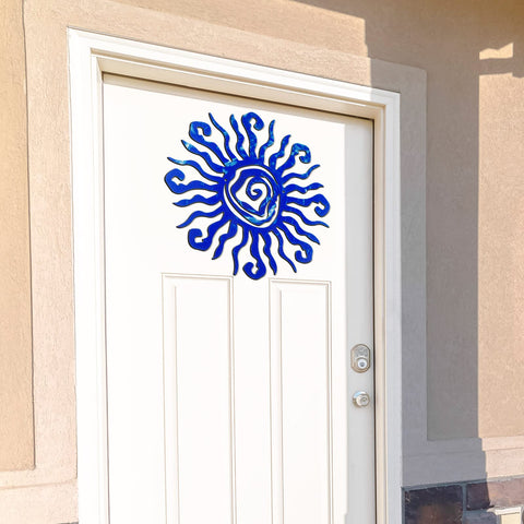 Bold blue sun wall decor by Moxweyeni for garden or patio walls