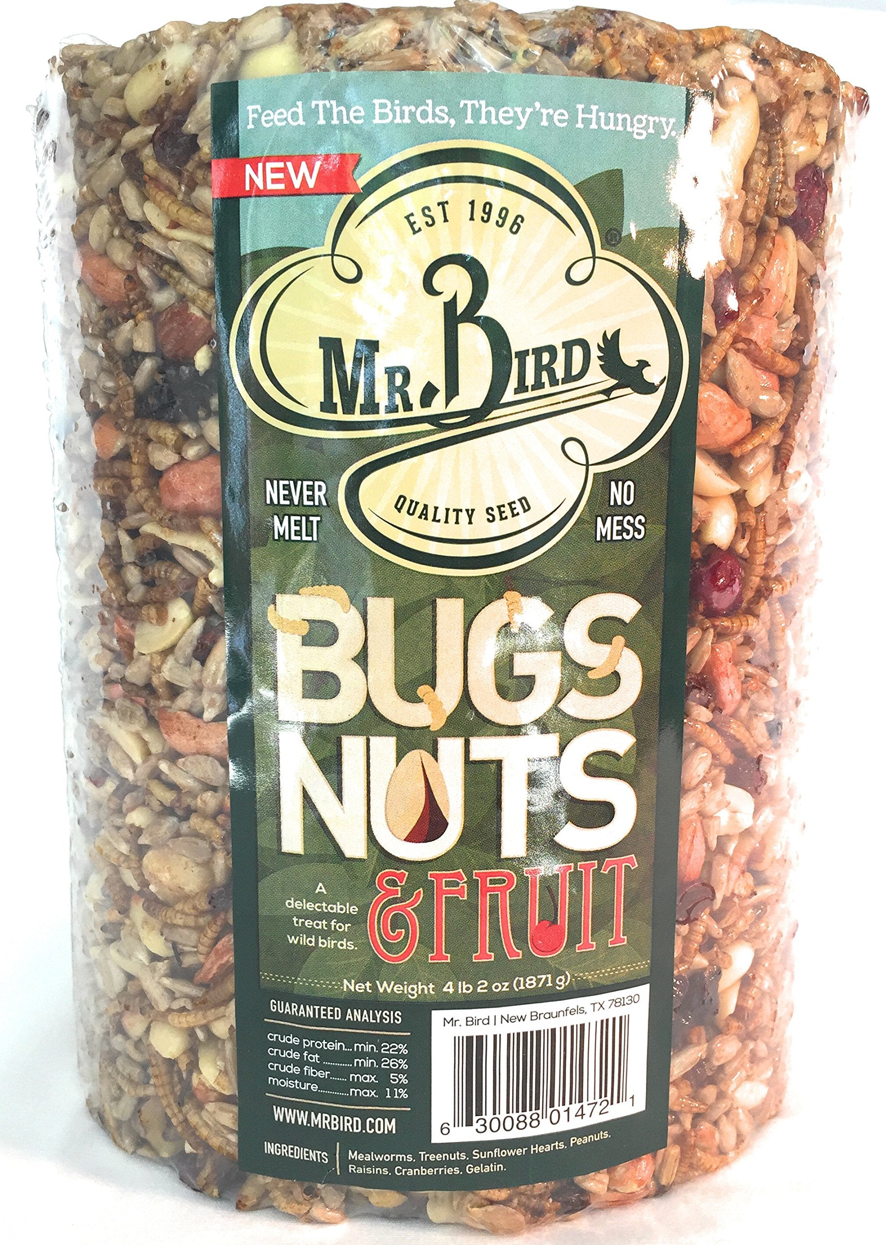Mr. Bird seed cylinder in a yard encouraging year-round bird visits.
