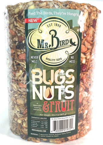 Mr. Bird seed cylinder in a yard encouraging year-round bird visits.