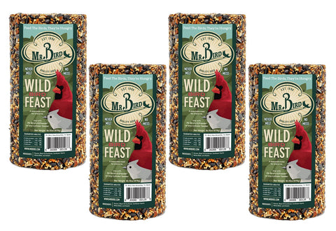 Mr. Bird Wild Bird Feast Cylinder 28 oz pack mounted on a feeder for long-lasting yard feeding.