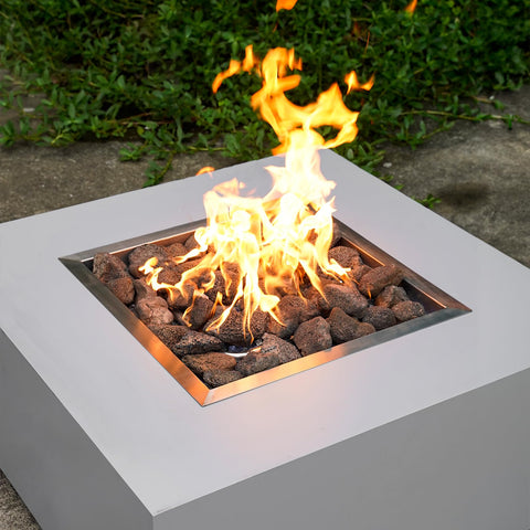 Mr. Fireglass lava rock used in a gas log set for authentic look.