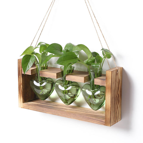 MTsigns heart vase on a natural wooden stand for desk decor