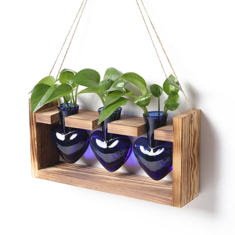 MTsigns heart-shaped vase on wooden stand enhances desk decor with mineral-pigmented glass