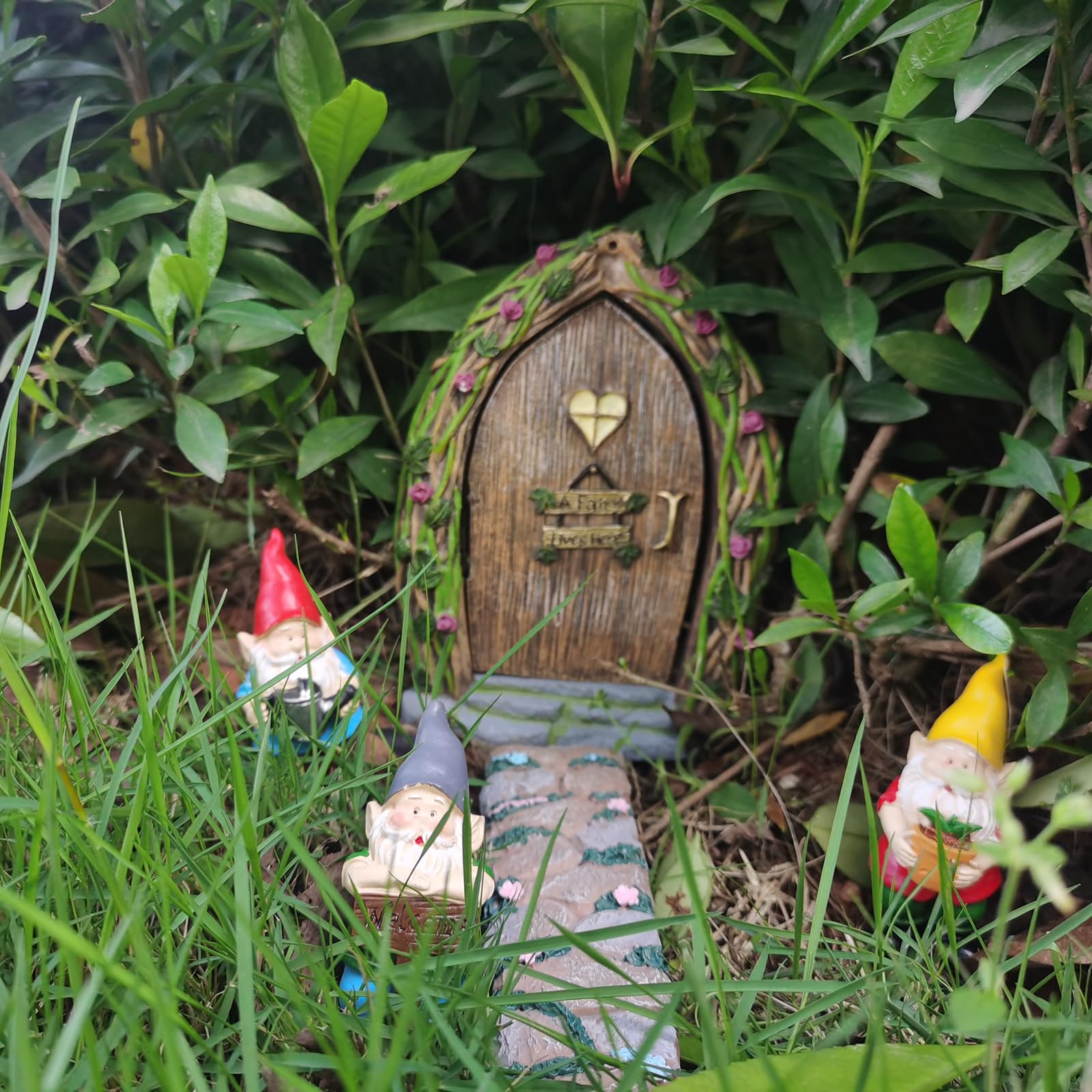 MUAMAX garden gnome collection complements plant beds with playful characters.