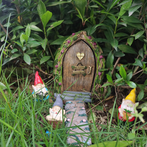 MUAMAX garden gnome collection complements plant beds with playful characters.