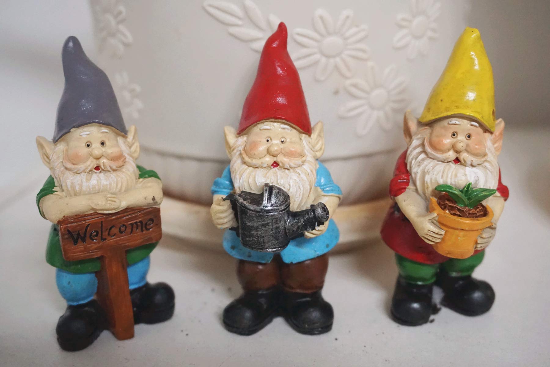 MUAMAX hand-painted gnomes with bright colors enhance fairy garden aesthetics.