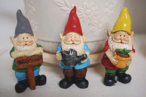 MUAMAX hand-painted gnomes with bright colors enhance fairy garden aesthetics.