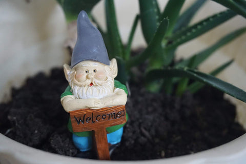 MUAMAX lawn figures create whimsical focal points in outdoor spaces.