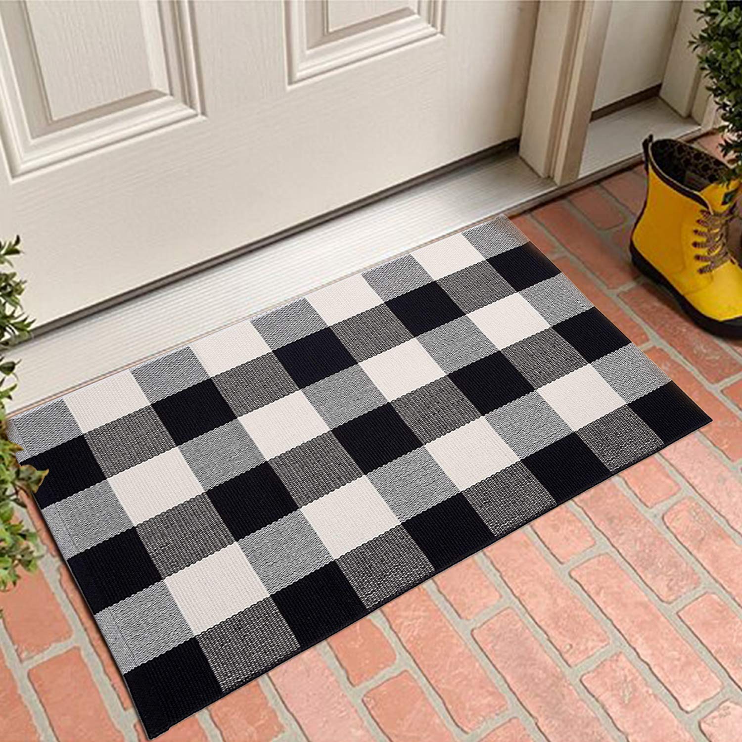 MUBIN cotton buffalo plaid rug at the front door showing soft texture and clean lines.
