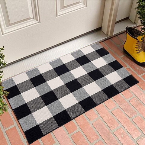 MUBIN cotton buffalo plaid rug at the front door showing soft texture and clean lines.