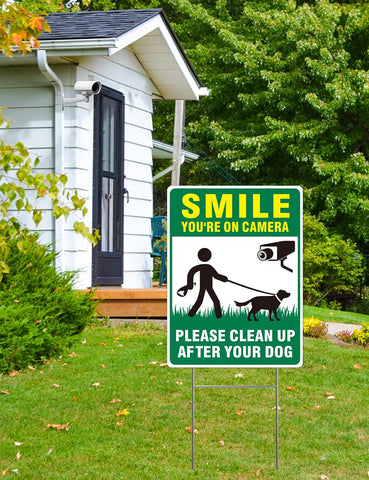 Multiwins no-poop sign supports neighbor-friendly yard rules.