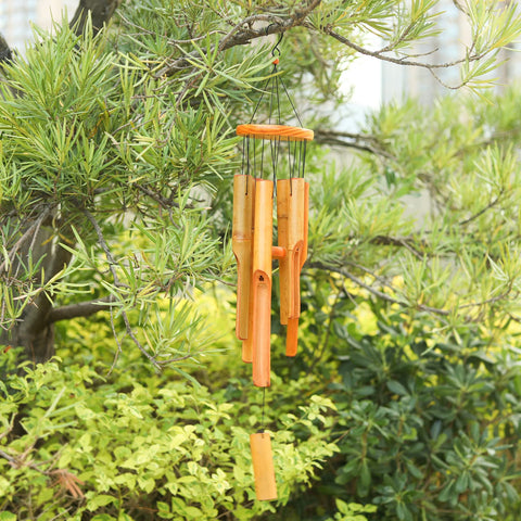 MUMTOP bamboo wind chimes in garden setting highlight natural decor and sound.