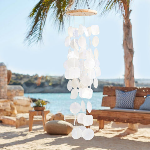MUMTOP wind chime with white capiz and outdoor ambience.
