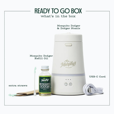 Murphy's Naturals Mosquito Dodger Zone compact unit on a table for portable protection.