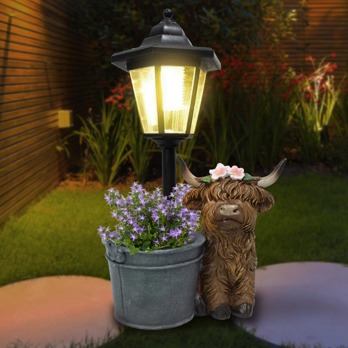 Muzzysse Highland Cow statue with flower pot enhances outdoor spaces and provides drainage.