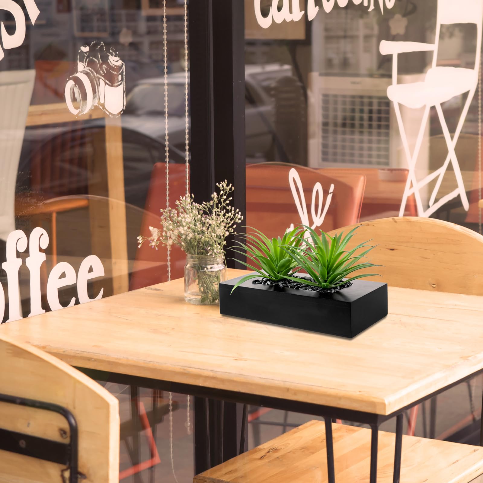 Windowsill arrangement offers instant greenery with no watering needed.