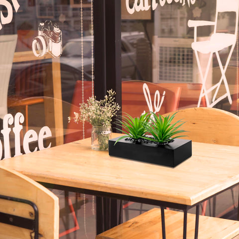 Windowsill arrangement offers instant greenery with no watering needed.