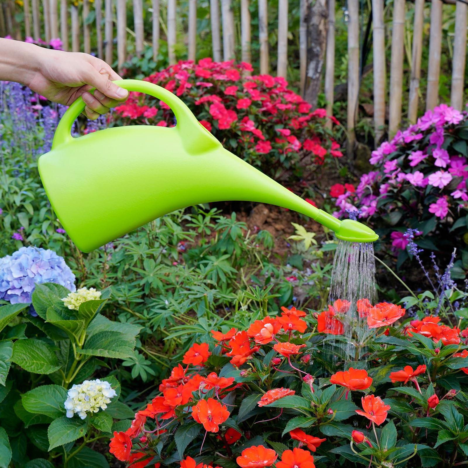 MyLifeUNIT large capacity green watering can minimizes refills during plant care.