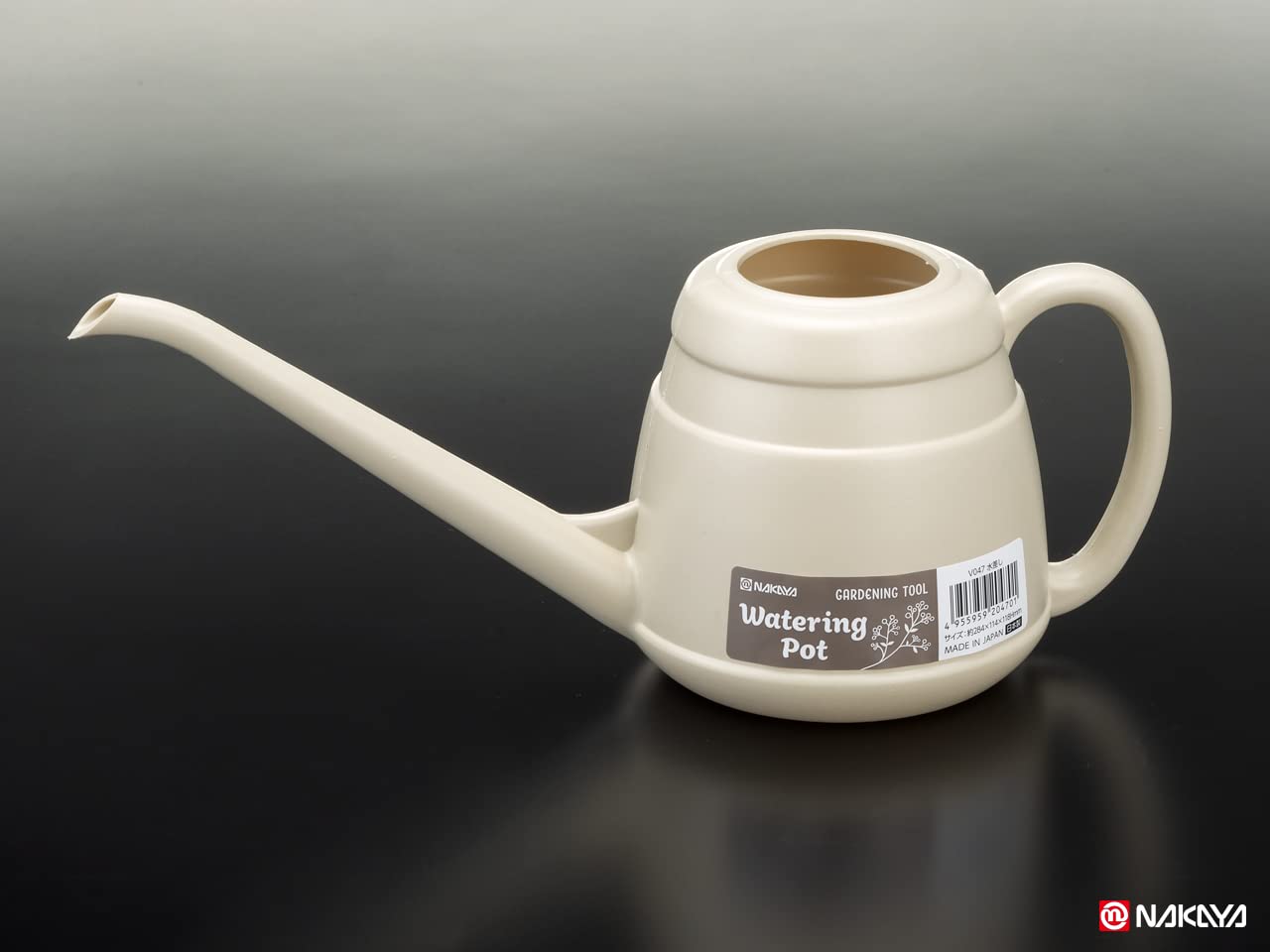Nakaya long-spout watering can handle closeup for precise indoor watering.