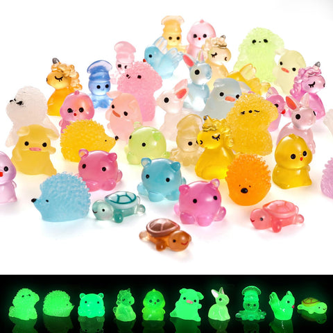 Naler glow resin ducks brighten a fairy garden at dusk for charming scenes