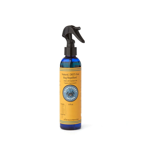 Nantucket Spider insect repellent 8oz bottle pouring to cover skin and clothing.