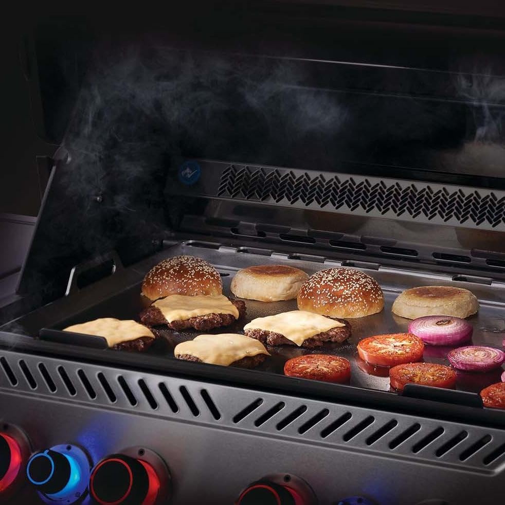 Napoleon spacious 26x16 inch surface supports large batches and diverse recipes.