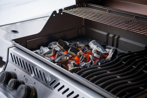 Napoleon tray allows wood chip flavor with gas grilling