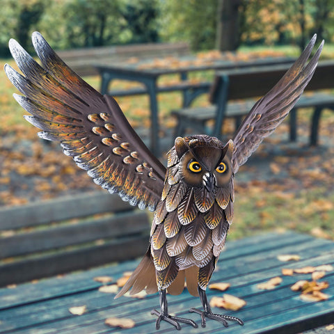 Natelf owl statue 19x10x15 inches fits neatly in any yard.