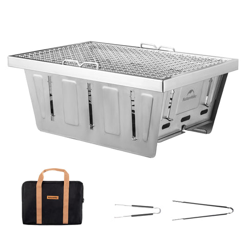 Naturehike camping charcoal grill in use with IGT table, sturdy and versatile for outdoor cooking.
